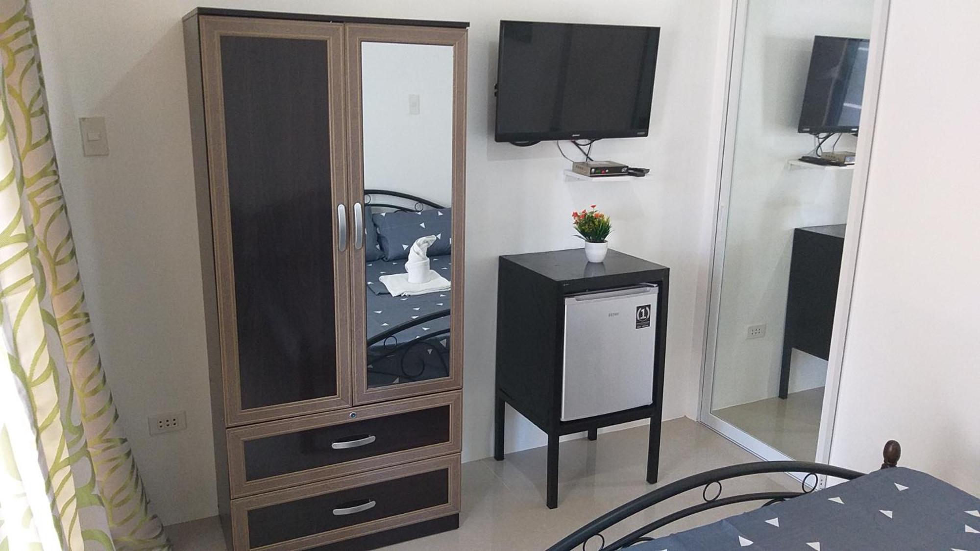 Ub Home Dauis Bilik gambar
